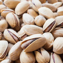 Close up of fresh pistachios. Whole background.