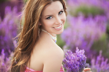 Happy woman lavender flowers, smiling beauty girl lavender field