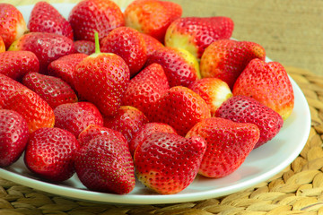 Fresh Strawberry on a Wooden Rustic Dish