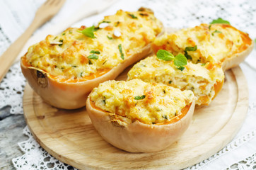 baked pumpkin with millet, vegetables and herbs