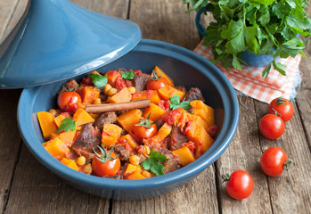 Moroccan Tagine with beef, chickpeas,  pumpkin and cherry tomato