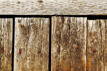 Vertical wooden planks fence boardwalk
