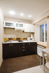 Spacious studio apartment, view of the kitchen.