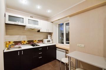 Spacious studio apartment, view of the kitchen.