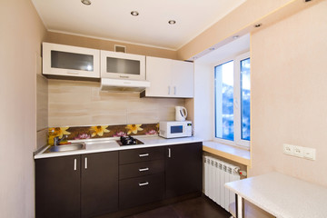 Spacious studio apartment, view of the kitchen.