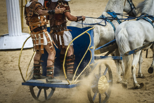 chariot race in a Roman circus, gladiators and slaves fighting
