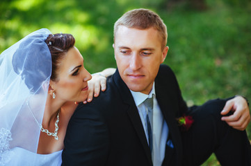 Bride and Groom at wedding Day walking Outdoors on spring nature