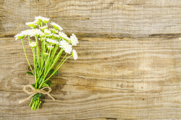 Empty wooden background with flowers