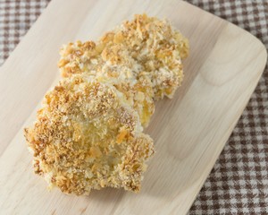 Delicious Japanese Pork Cutlet or Tonkatsu on Wooden Board