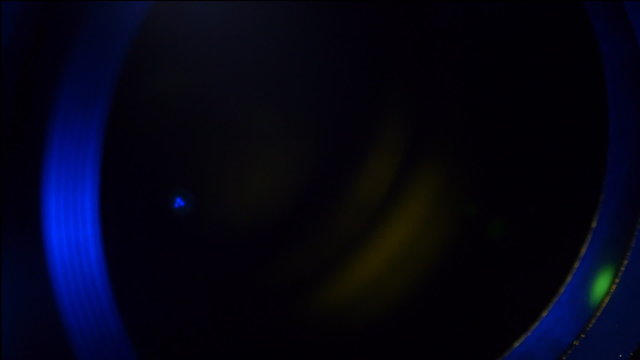 Lens zoom in the darkness