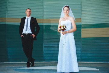 Bride and Groom at wedding Day walking Outdoors on spring nature