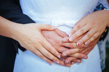 Bride and Groom at wedding Day walking Outdoors on spring nature