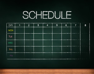 schedule on chalkboard