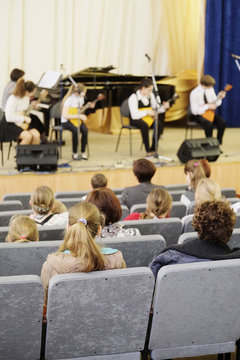 Spectators watch the concert