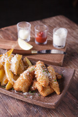 Fish and chips with potato wedge