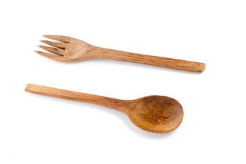 Close-up of wooden spoon isolated over white