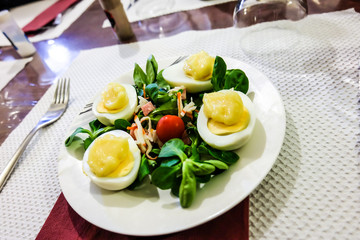  stuffed eggs with mayonnaise in plate