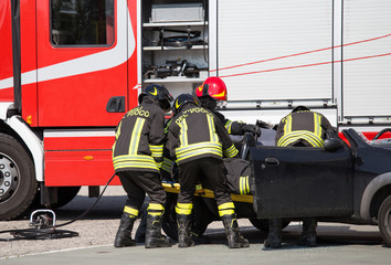 Firefighters pull in wounded by car plates after road crash