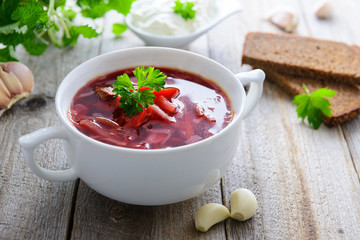 Traditional russian cuisine - borsch (soup from beetroot and cabbage)
