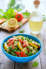 Salad from couscous and vegetables