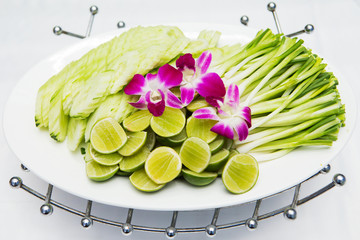 Vegetable side dishes in white.