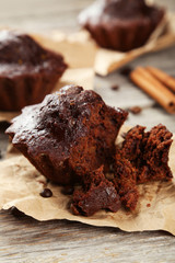 Chocolate cupcake on grey wooden background