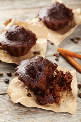 Chocolate cupcake on grey wooden background