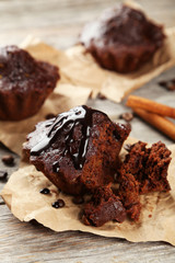 Chocolate cupcake on grey wooden background