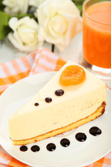 Cheesecake on the plate on white wooden background