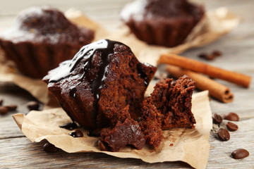 Chocolate cupcake on grey wooden background