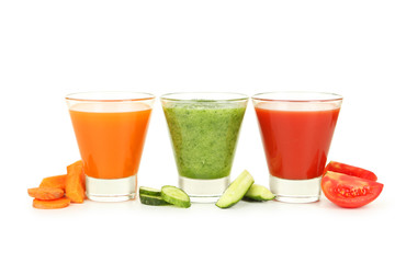 Fresh tomato, carrot and cucumber juice isolated on white
