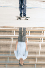 skateboarder riding a skateboard on the street or park