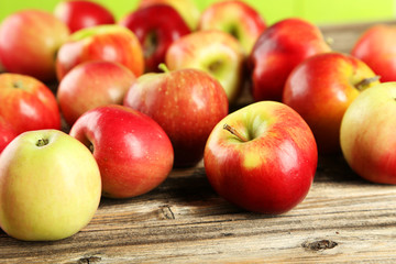 Apples on brown wooden background