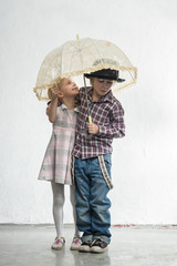 Children under the umbrella