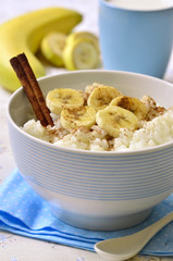 Milk rice porridge with banana,cinnamon and honey.