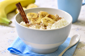 Milk rice porridge with banana,cinnamon and honey.