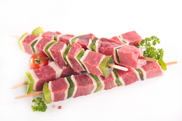 raw beef kebab on white background