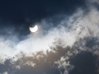 Obraz na płótnie Canvas Partial Solar Eclipse on a Cloudy Day 20.03.2015