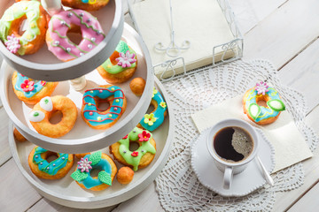 Tasty donuts with colorful decoration