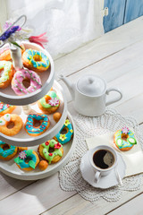 Delicious donuts with colorful decoration