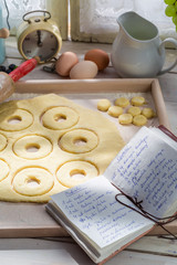 Preparation for tasty donuts in the sunny kitchen