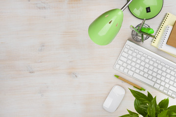 Office accessories over working desk with copyspace on the right