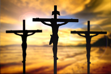 Silhouette of Jesus with Cross over rainbow sunset concept for religion, worship, Christmas, Good...