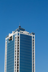 Blue Glass Office Tower with White Stone Corners