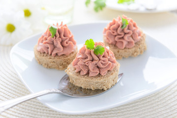 Festive snacks: canape with pate