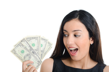 cheerful young brunette woman holding us dollars bills