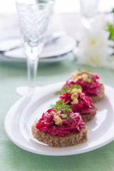 Snack from beetroot and walnuts