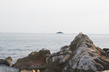 Rocks , sea and small island