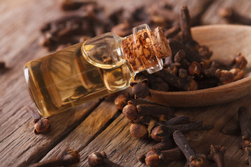 Oil of cloves in the bottle close-up  horizontal
