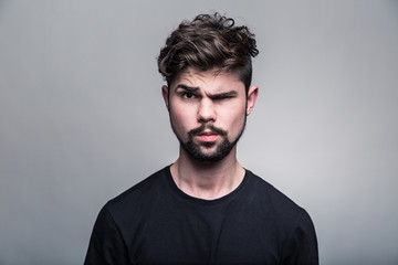 Portrait of young man in  black T-shirt